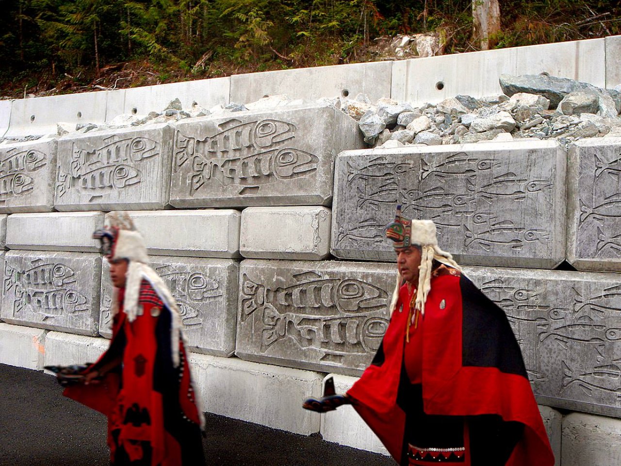 salmon and herring relief sculpture lock-block walls.